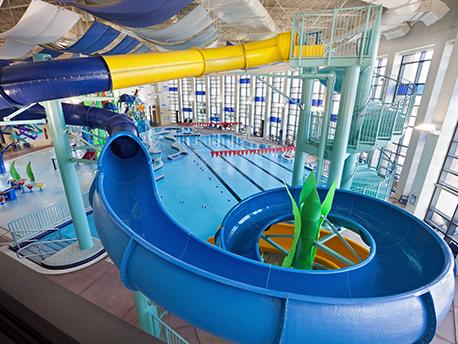 Indoor swimming pool with large twisting slides