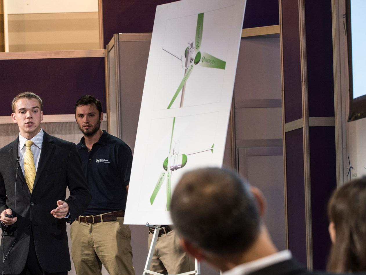 Kyle Dolf, mechanical engineering junior, delivers the Penn State team's public pitch with Lucas Maass, energy business and finance senior looking on.