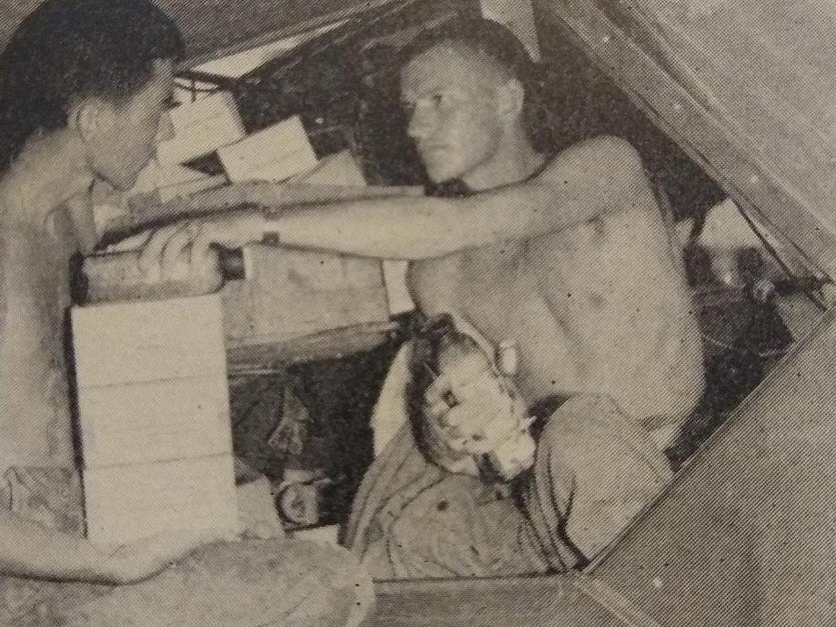 Two soldiers in a tent