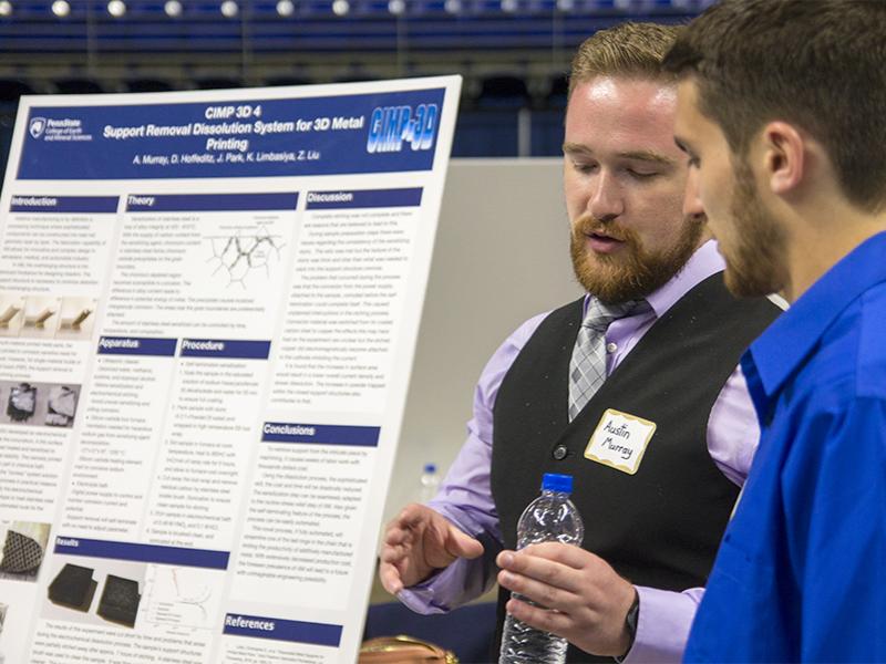 Austin Murray, majoring in materials science and engineering, discusses a method for chemically removing bracing required for some 3D metal printing.