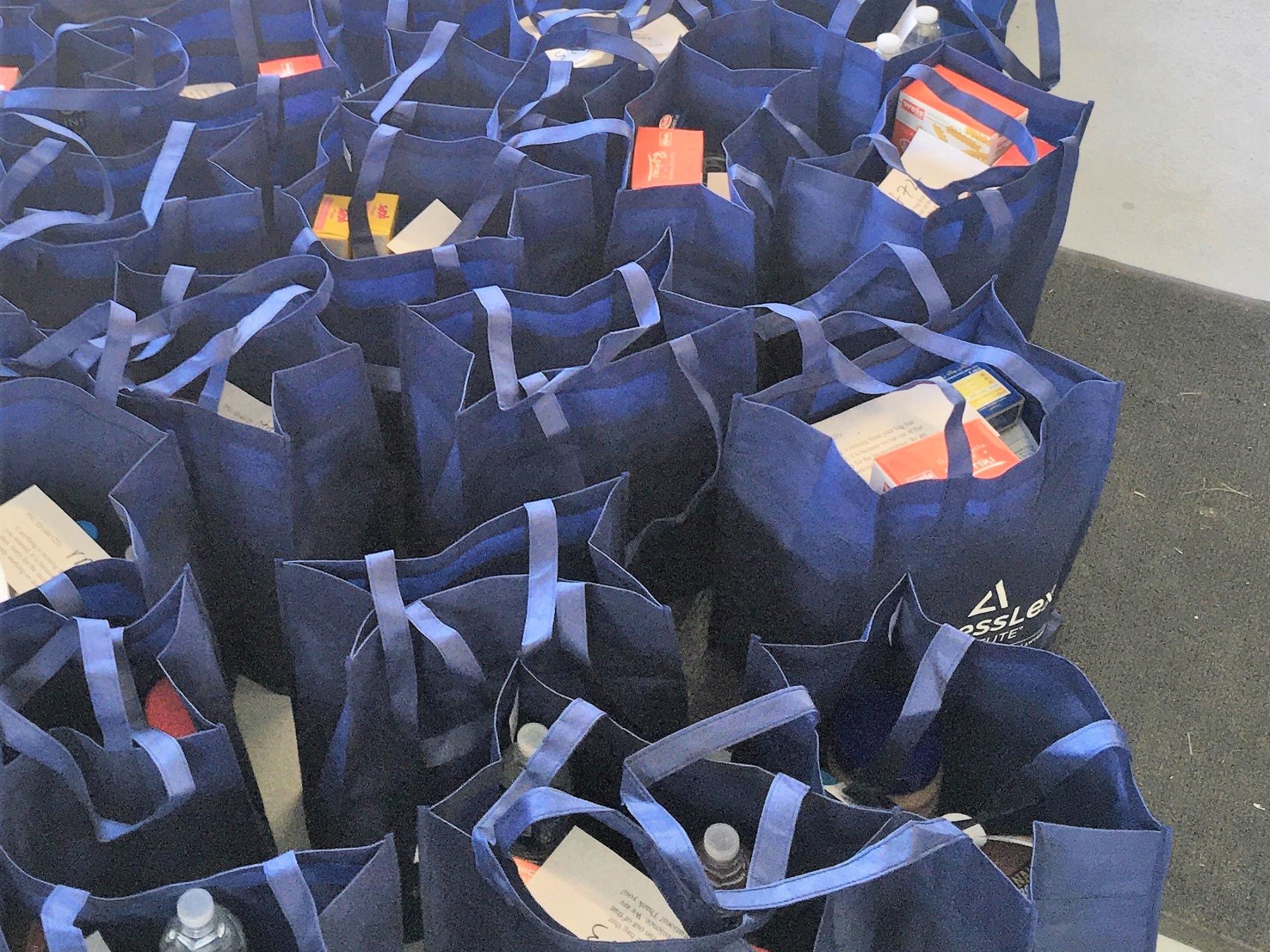 Bags filled with food for pick up at the Lion's Pantry