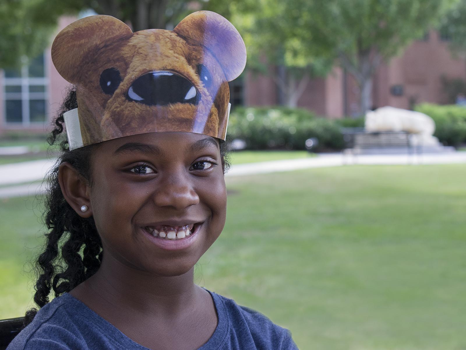 Child in lion headband