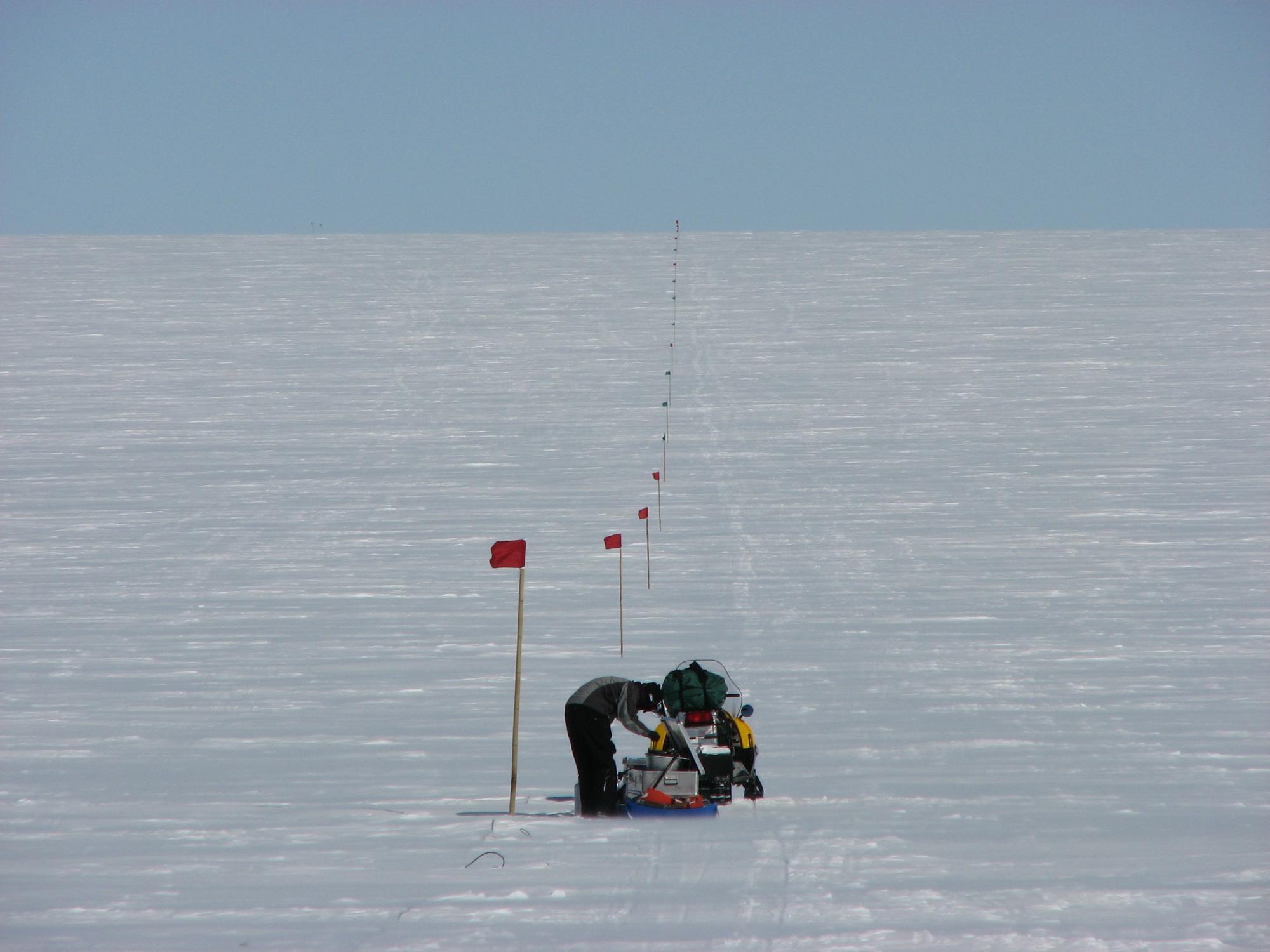 flags mark line of seismic sensors