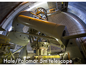 Three telescopes pointed at the sky