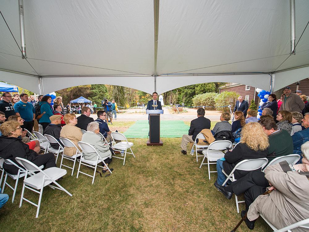 Interim Chancellor Ralph Ford speaks at the dedication of the Mary Behrend monument.
