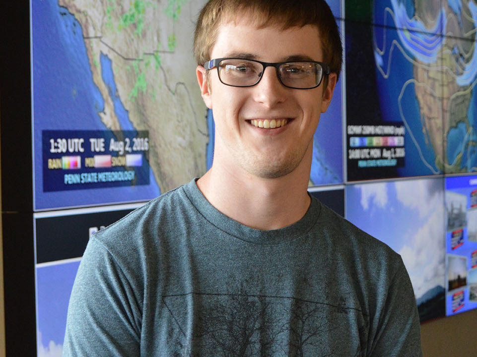 Matt Brown in front of Weather Wall