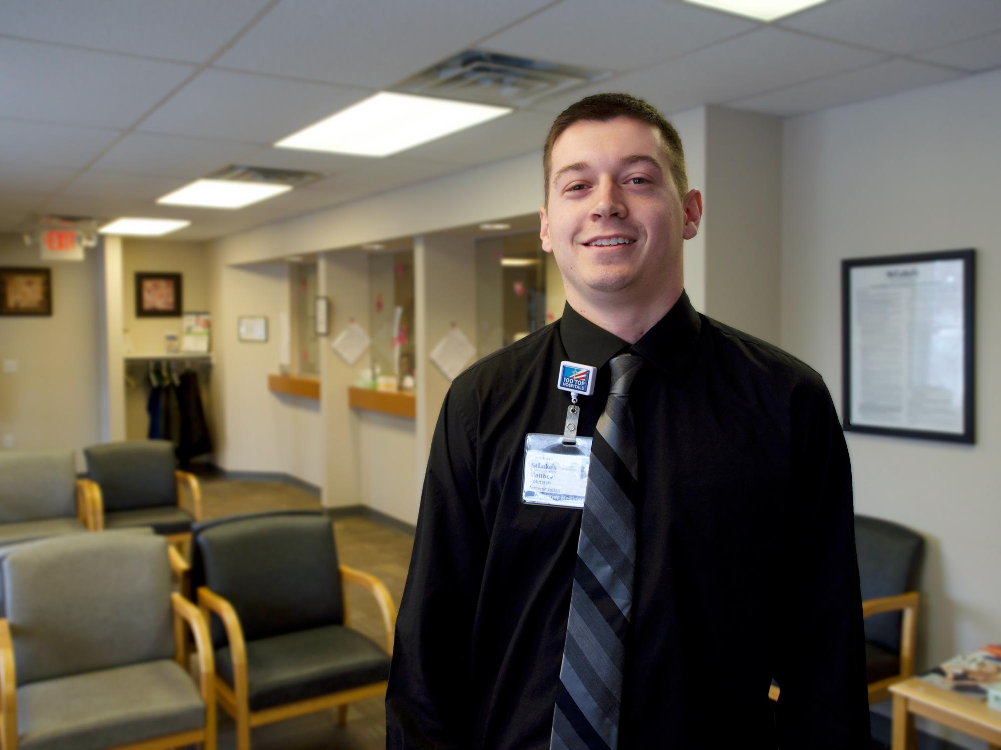 young man at medical office lobby