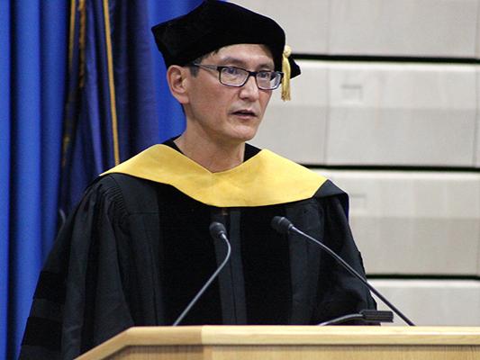 Dr. Ermek Nurkhaidarov, associate professor of mathematics, presented members of the faculty to the incoming class.