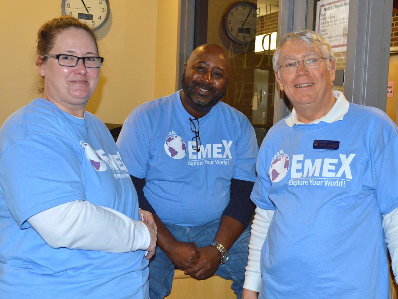 Nels Shirer stands with Stacy Davidson and James Guyton