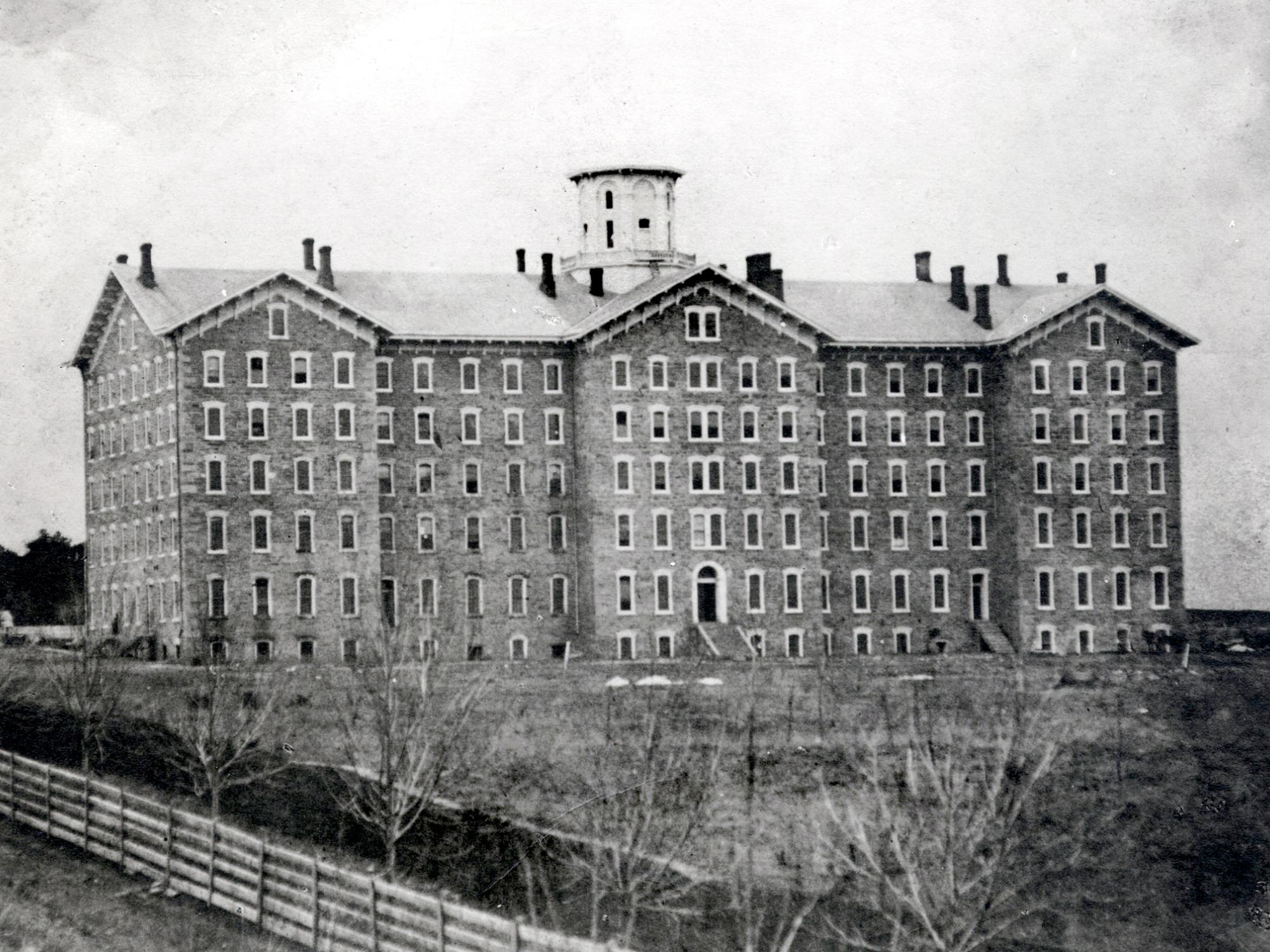 Penn State's original Old Main building, with its first tower