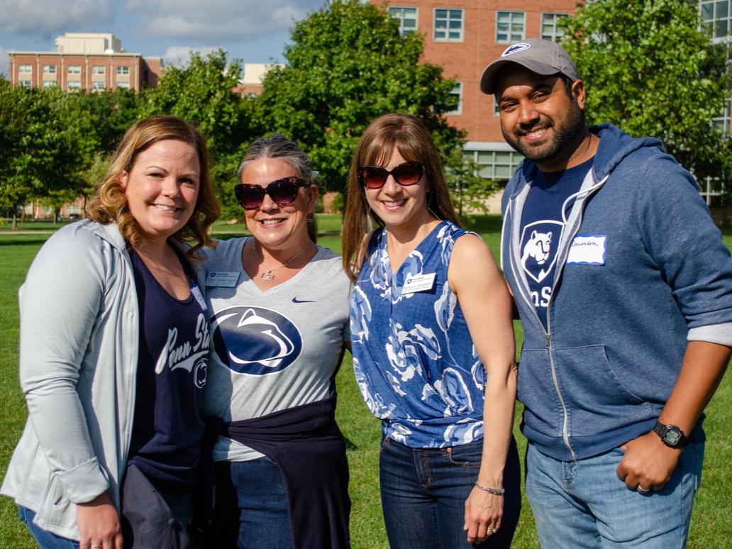 A group of Smeal PGP online students and the program coordinator and director during the PGP LION Weekend tailgate. 