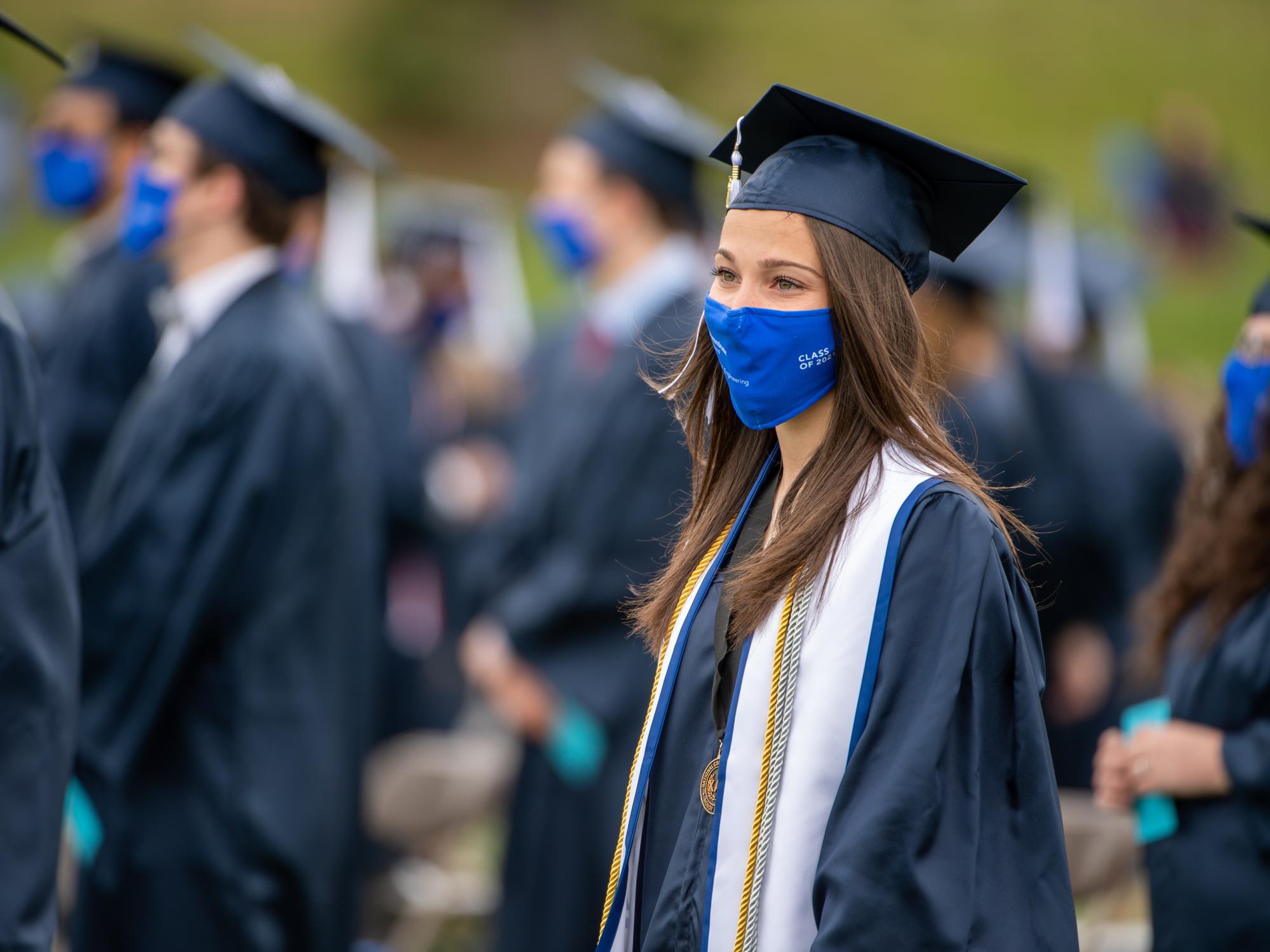 Penn State Behrend graduates await the start of the college's 2021 commencement programs.