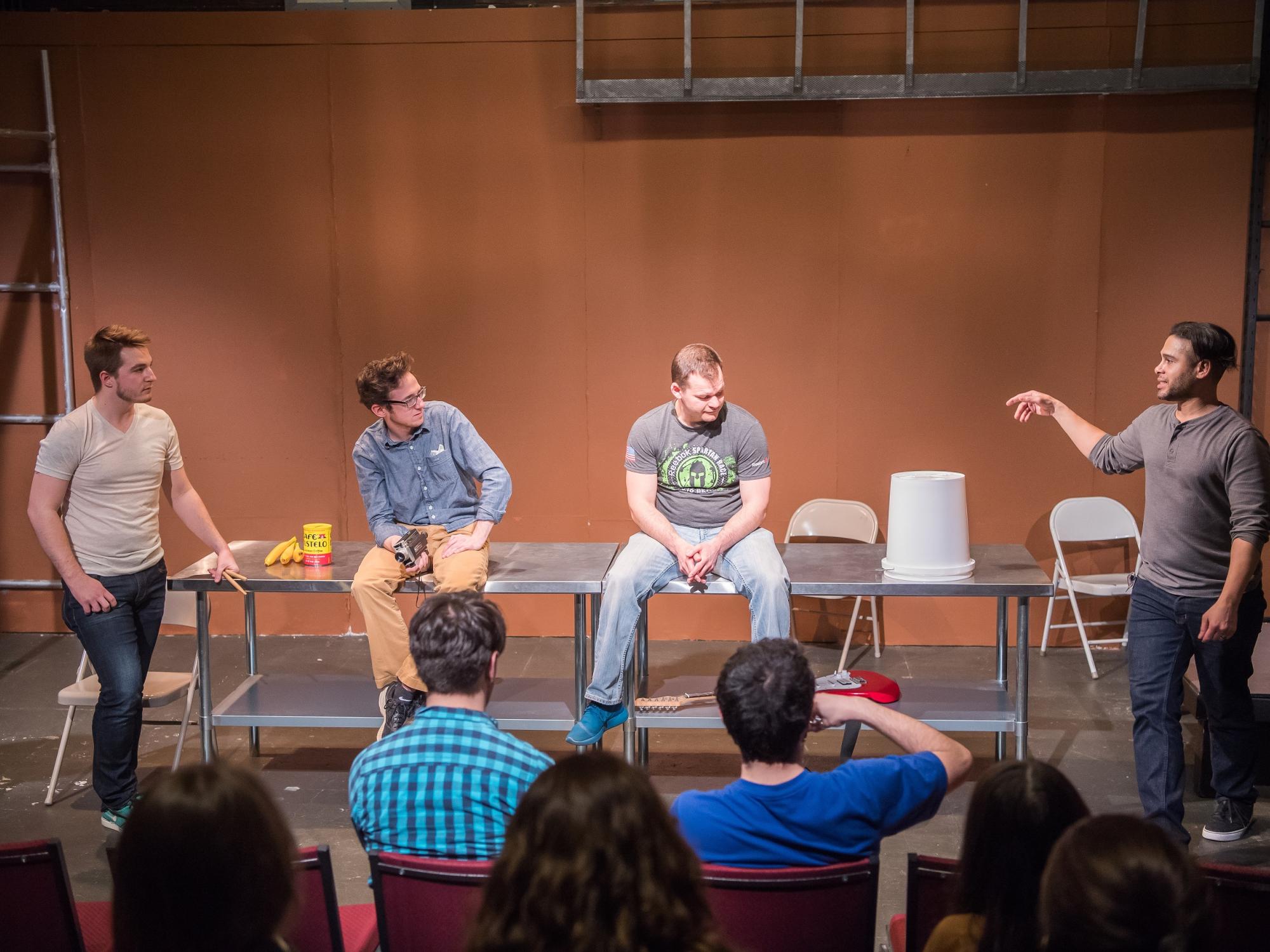 Wilson Jermaine Heredia, far right, meets with students during his to Penn State Behrend last month. 