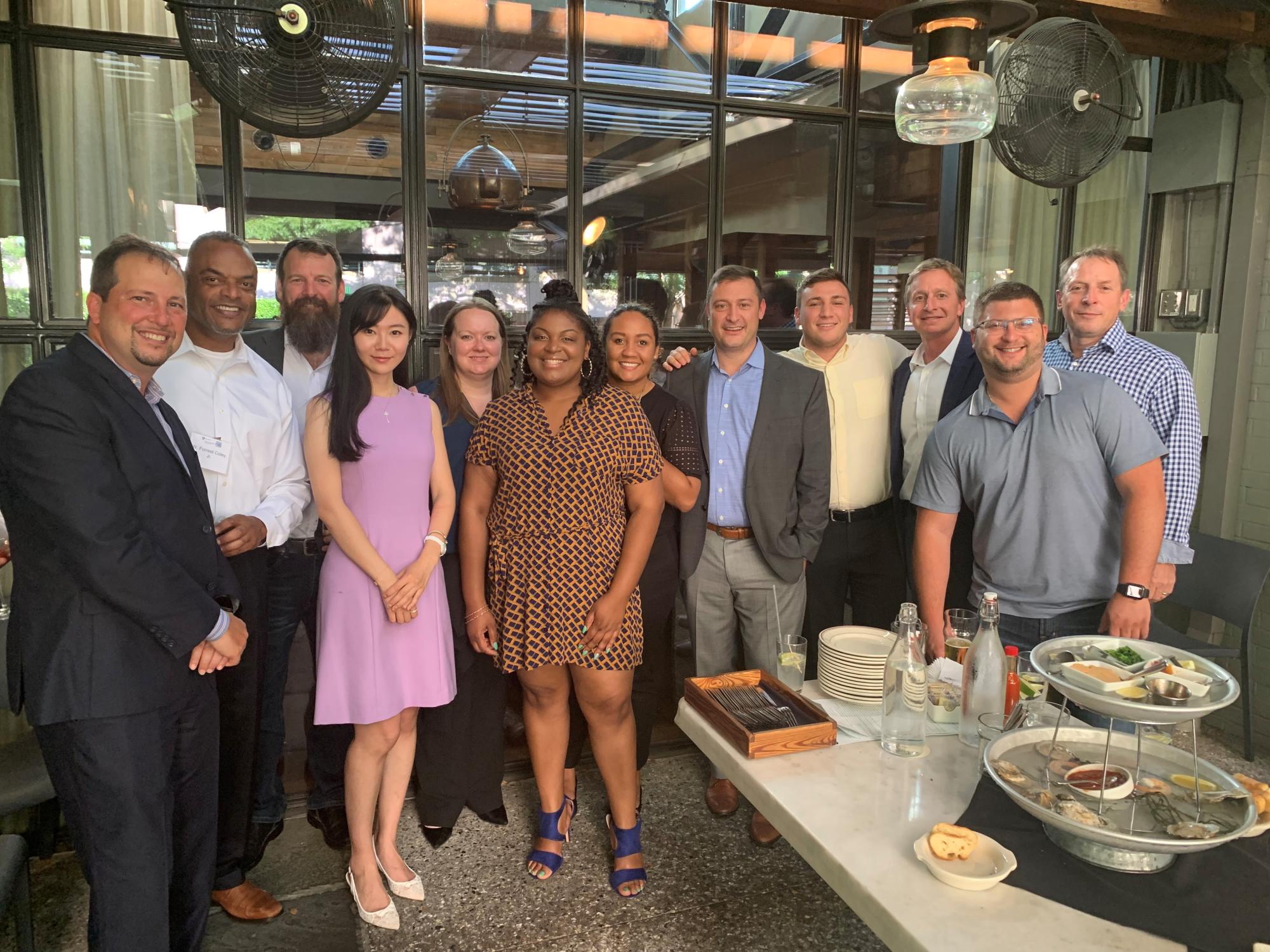 Felicia Kelly (center) and fellow alumni at Penn State Hotel & Restaurant Society event