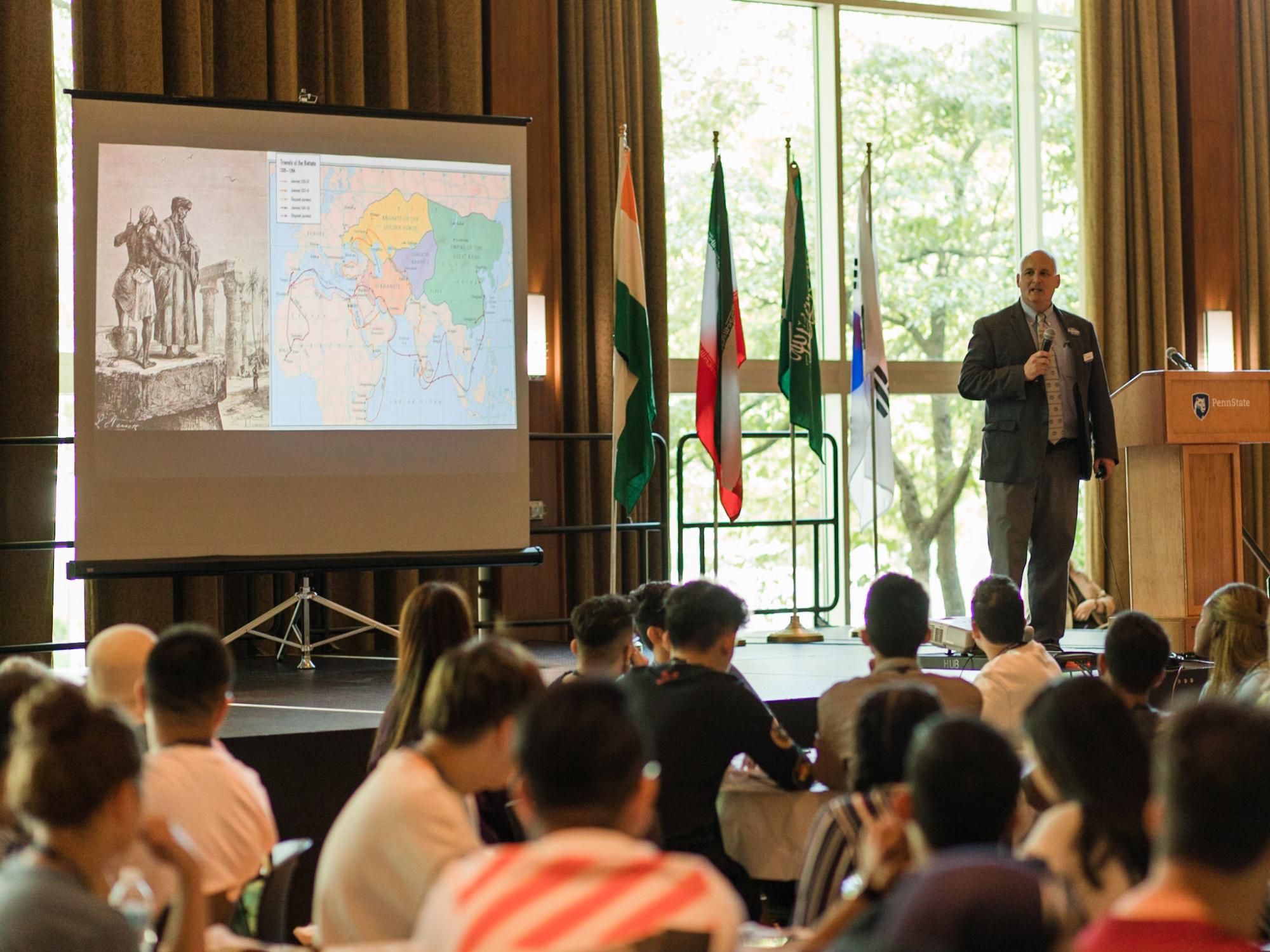Mel White gives a presentation on cultural differences to international students