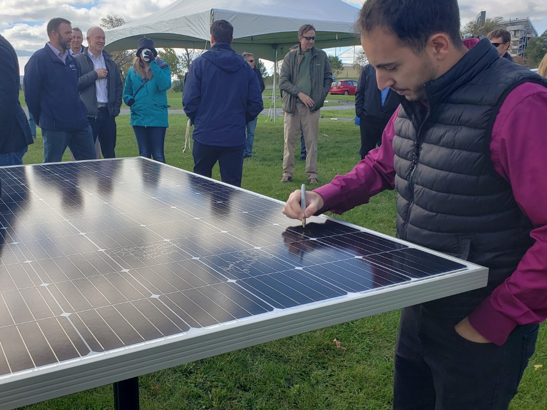Solar panel signing at Orchard Road solar array