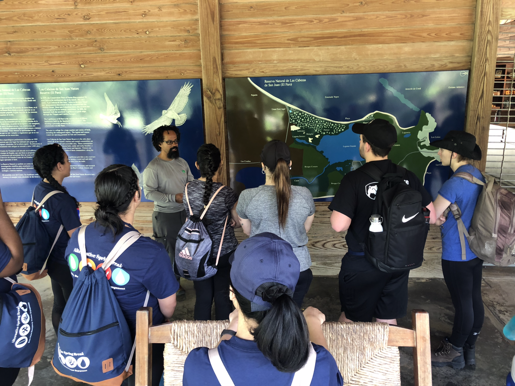 students looking at educational materials