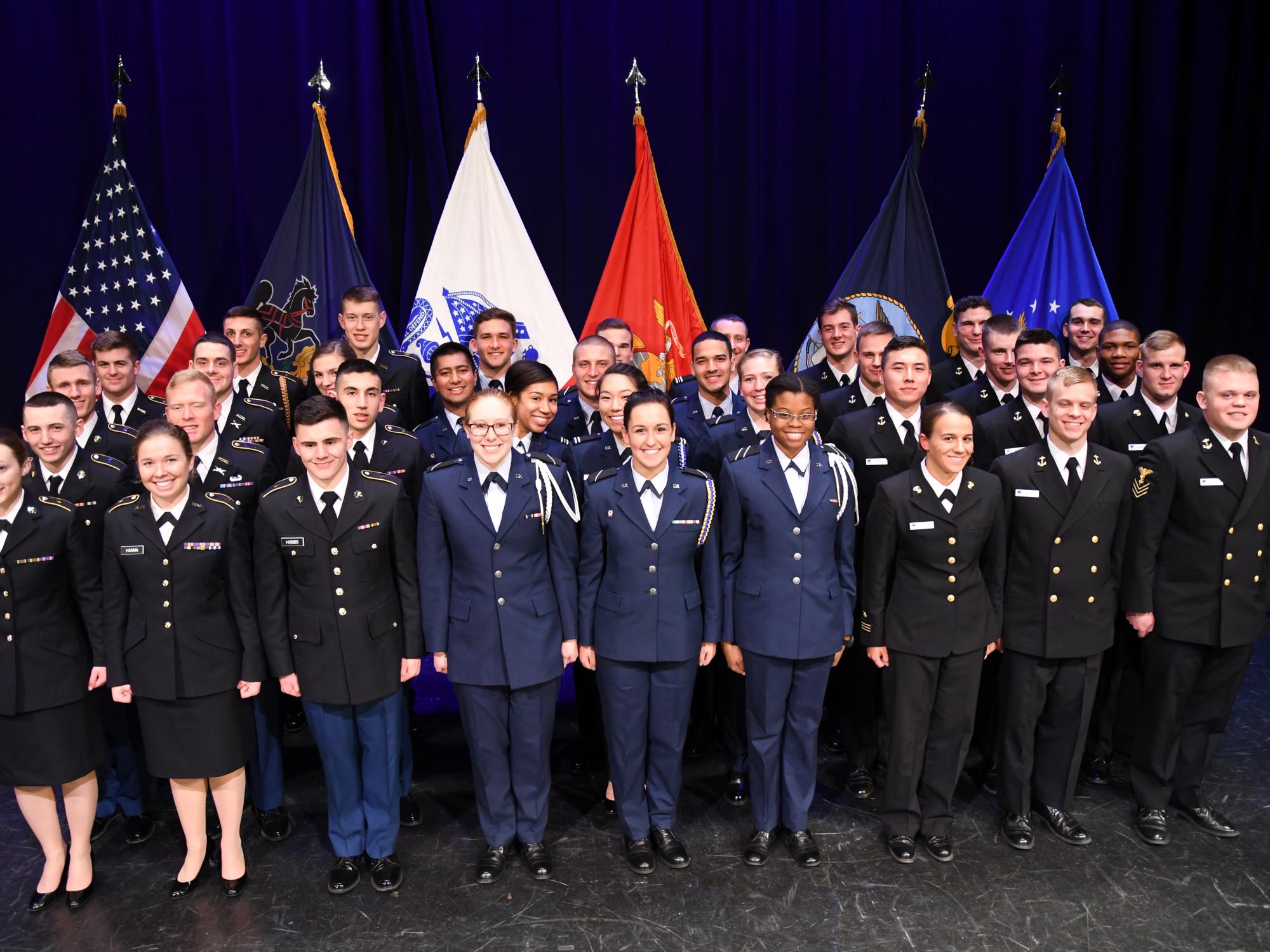 ROTC services gather in formation for photo