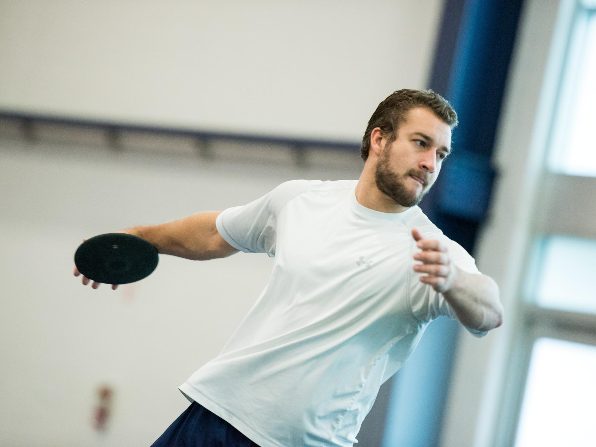 Max Rohn prepares to release the disc during an indoor training session.