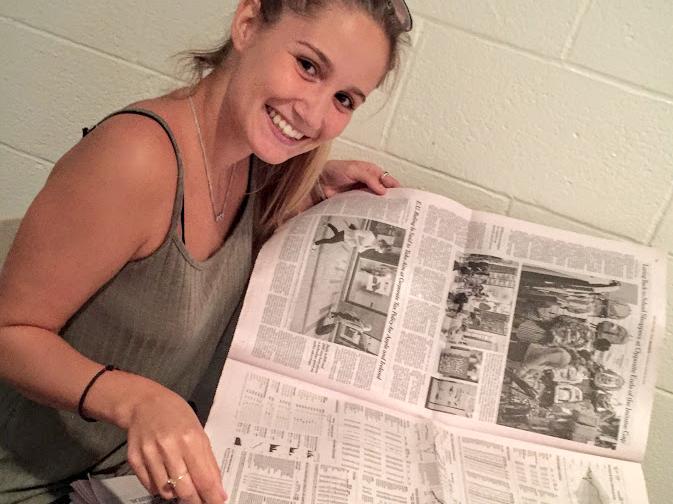 Student Reading Newspaper