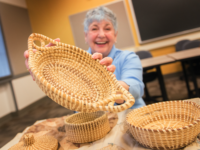 Fran Scalise with sweetgrass baskets