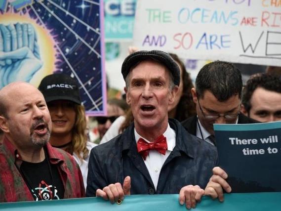 Scientists march through the streets of Washington D.C. 