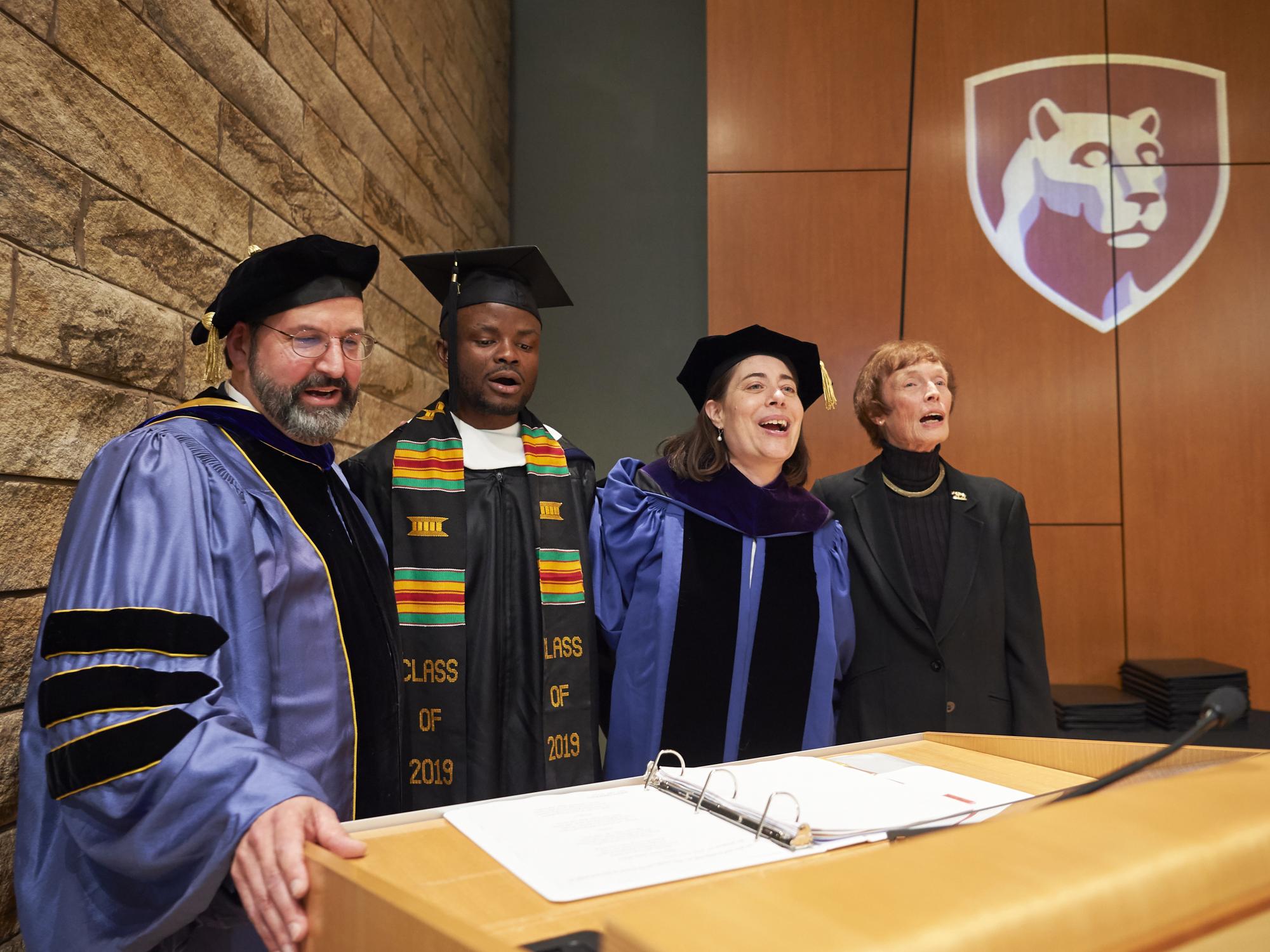 SIA Director Scott Gartner, student speaker Matthew Fully, Dean Hari Osofsky, and special guest Anne Riley
