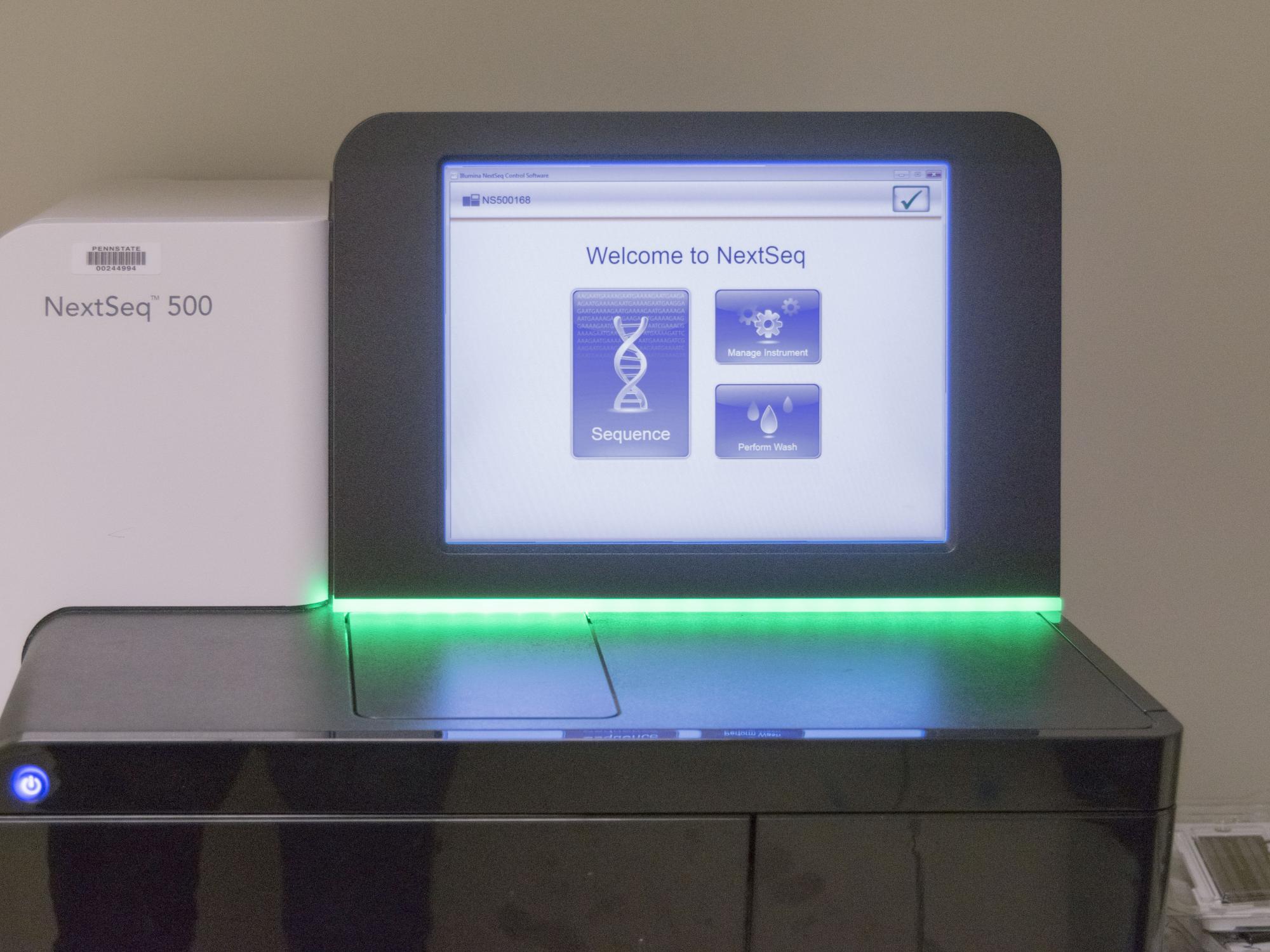 The lit home screen of a gene sequencer