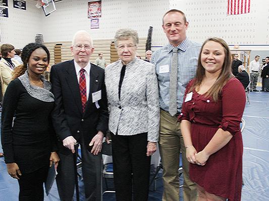 John and Pauline Shearer with cholarship recipients.