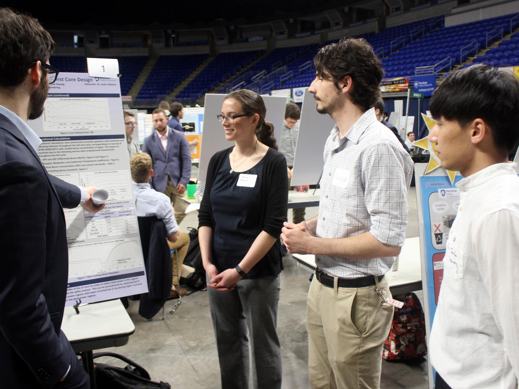 Students explain their capstone project during the design showcase