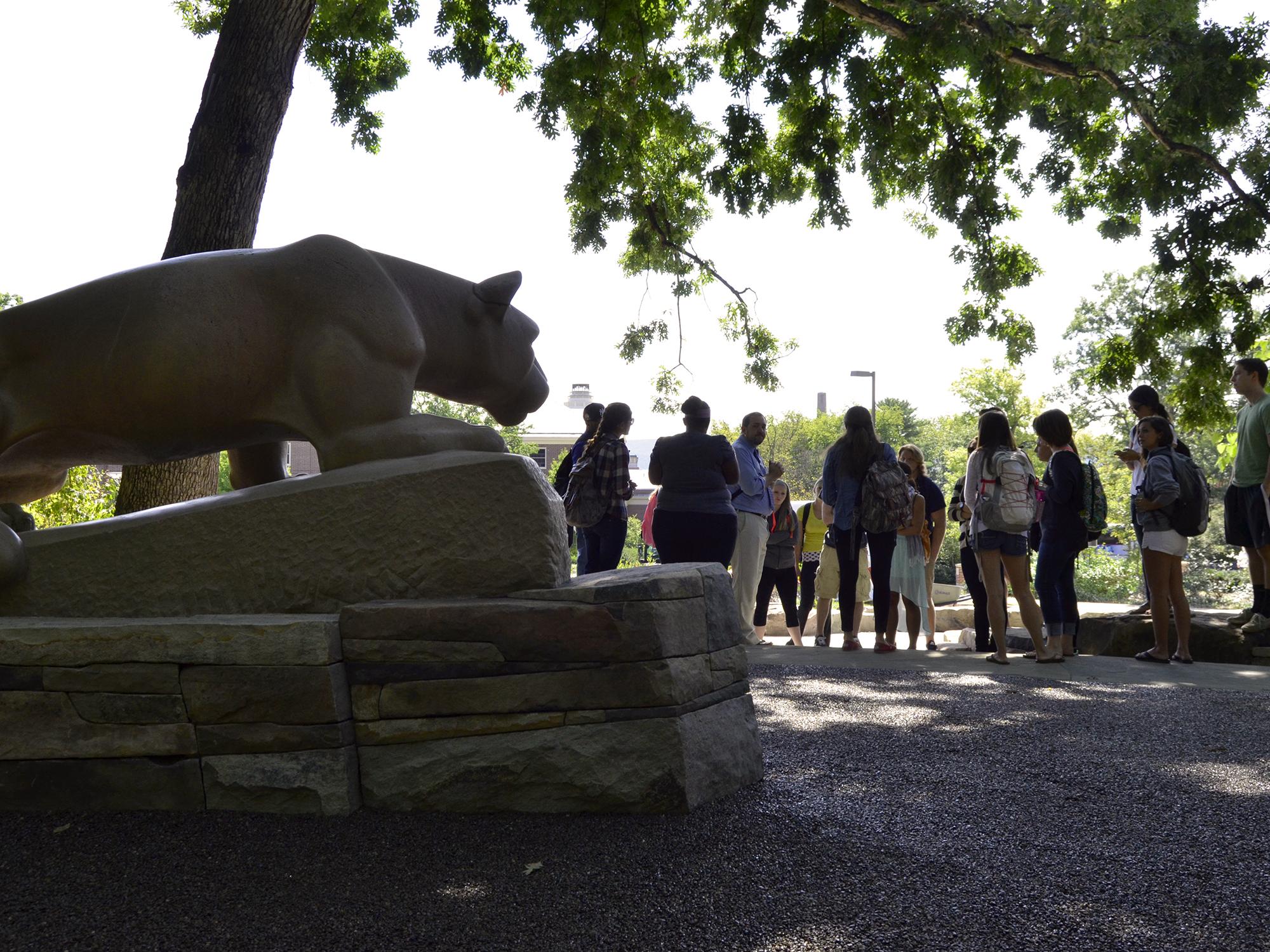 A group of students at the Nittany Lion shrine in September 2013