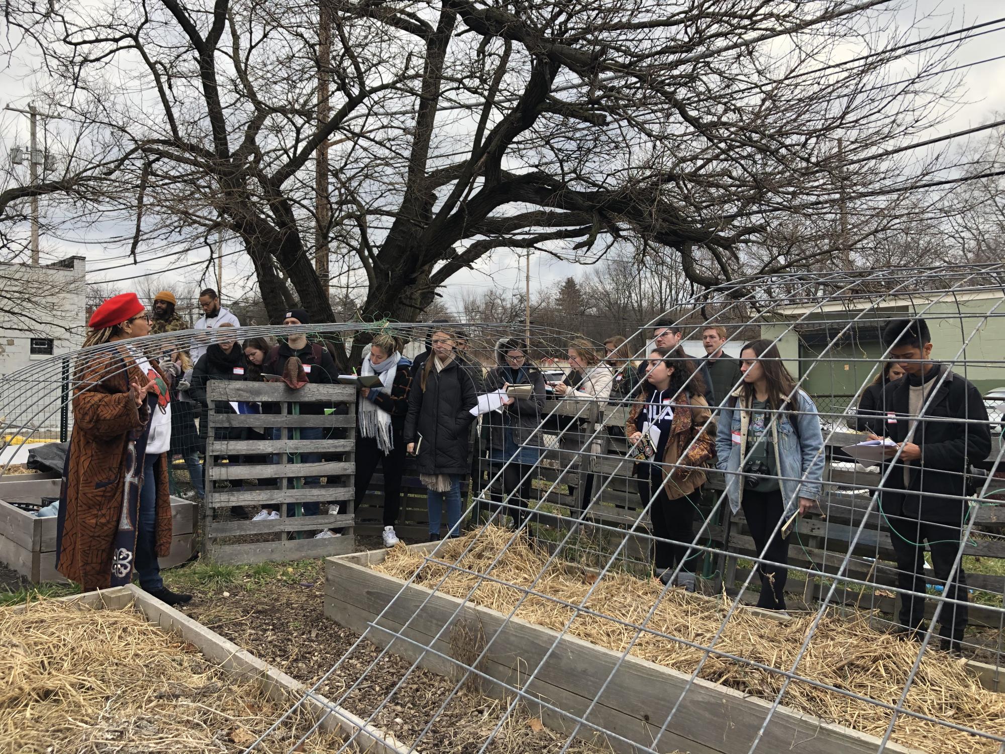 Vicki Ayanna Jones addresses the Penn State architecture students during their site visit of the Sankofa Village Community Garden in January 2020. 