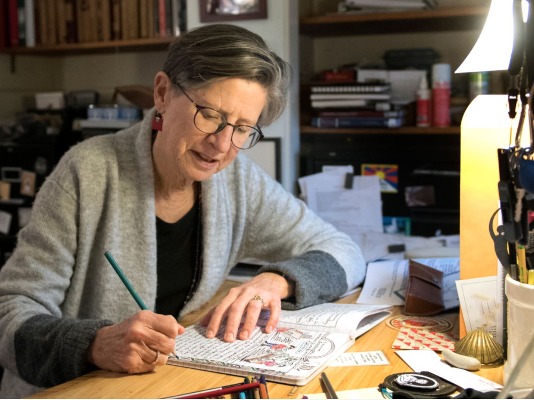 Susan Squier working on her comics journal
