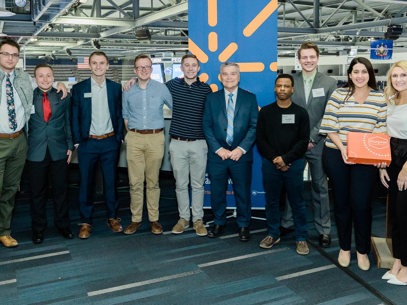 Penn State President Barron standing with student competitors of the 2019 Inc.U Competition