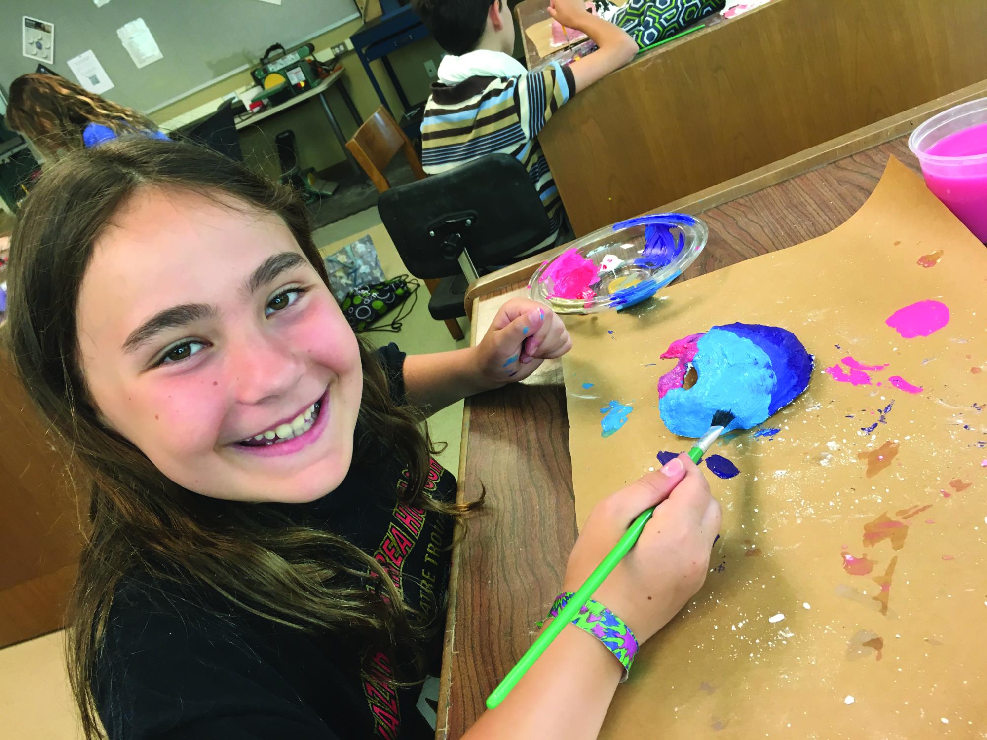 girl doing an art project
