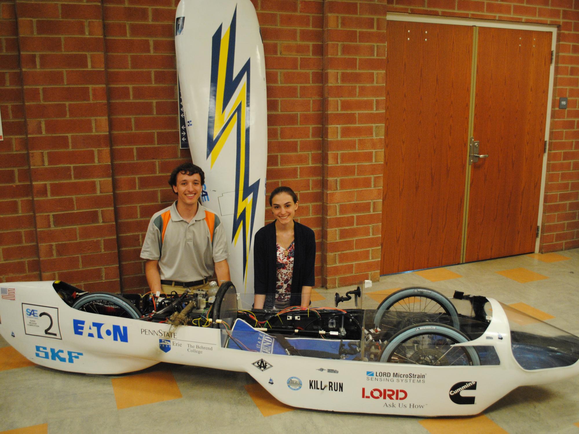 Cody Colpo and Katie Burbules are pictured here with the hybrid vehicle that Penn State Behrend's SAE Club designed for this year's Society of Automotive Engineers' International Supermileage Challenge.