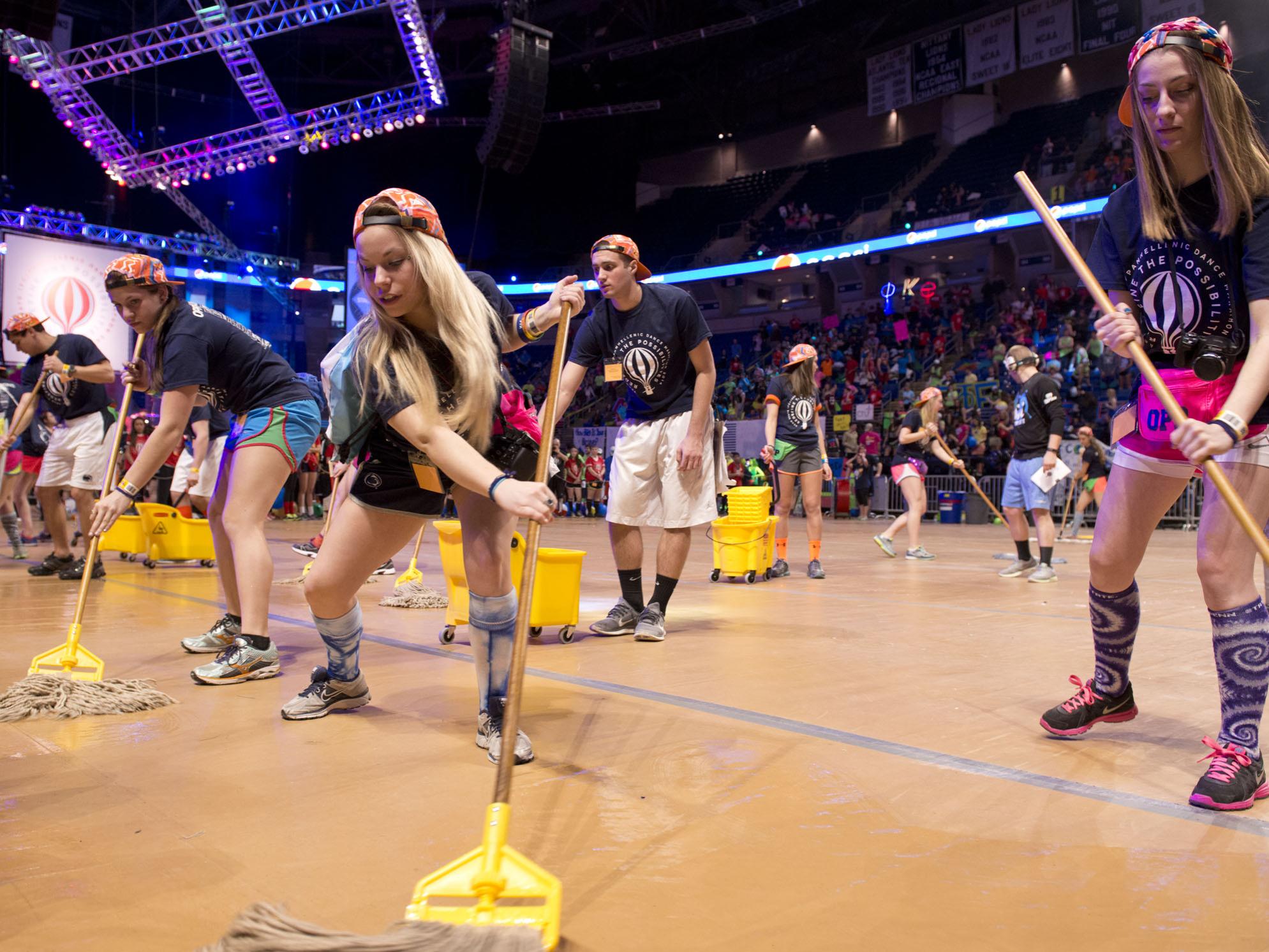 THON Operations Committee members mopping
