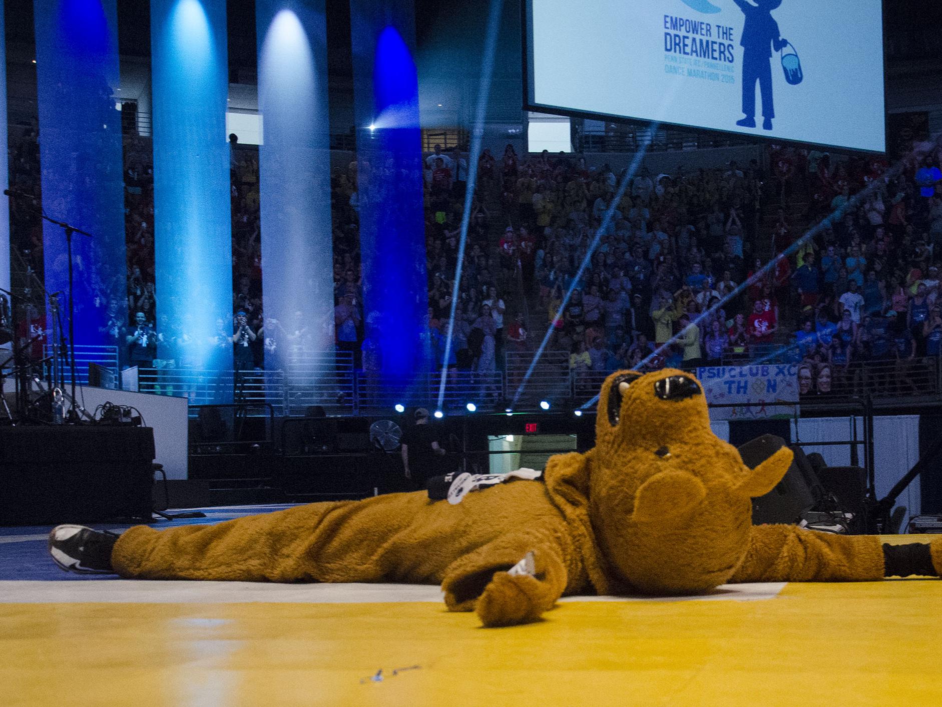 The Nittany Lion lying on the stage