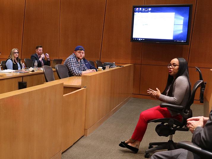 Teleicia Dambreville speaks during a labor law class