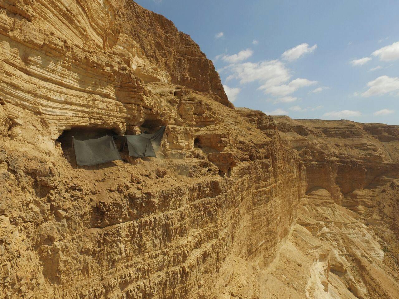 Falk-view of cave in high bluff