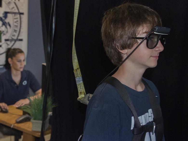 Technologist Finelli monitors youngster in Virtual Reality test