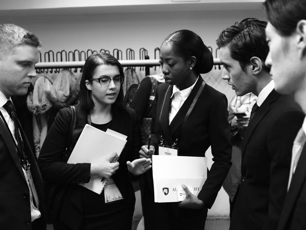 Vis Moot Team discussing the next round