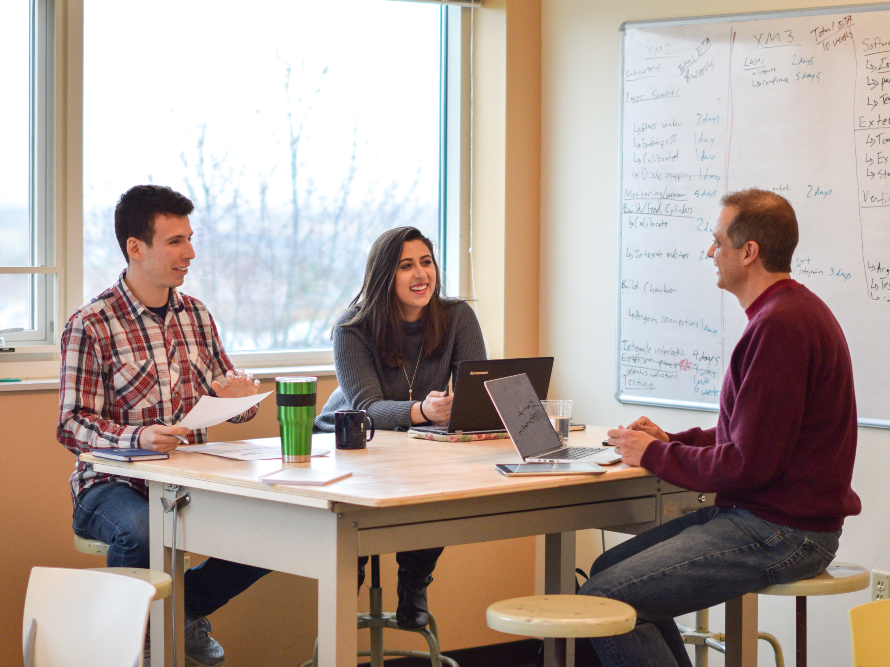 Chief Technology Officer Matt Woods (left), Chief Executive Officer Juan Mario Gomez (right) and intern Brenna McCornac