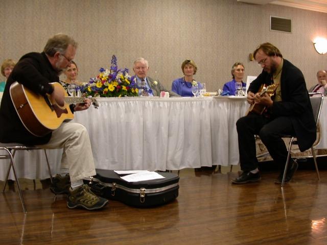 Michael Arthur plays guitar with Brad Sageman