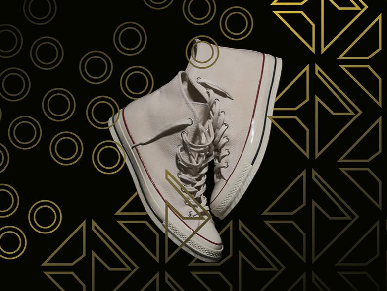 Concept for a storefront window display with lattice work intertwined with a pair of Converse Chuck 70s.