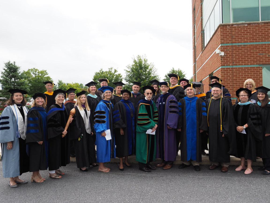 group of faculty in regalia