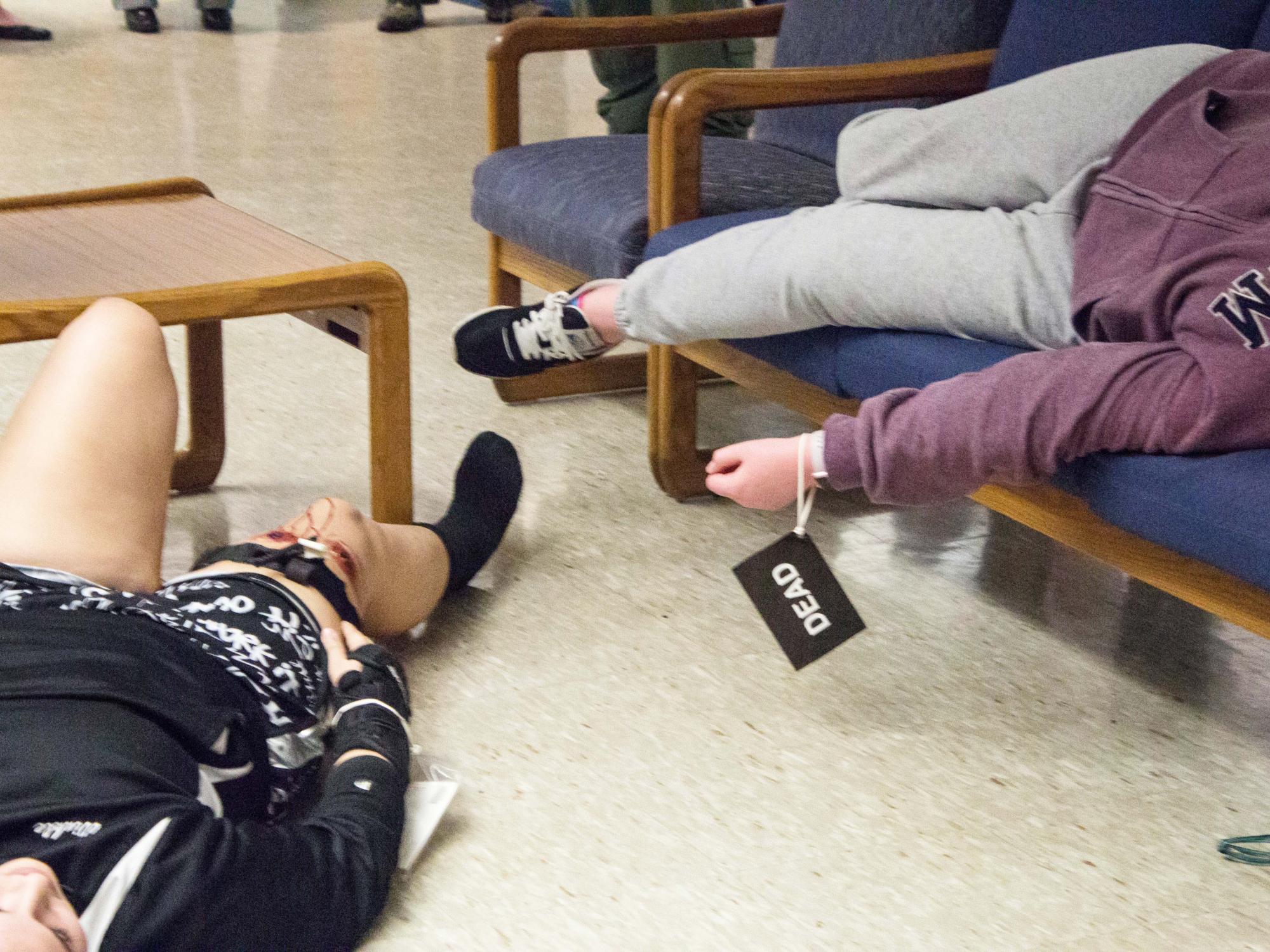 Students play dead during an active shooter training at Penn State Beaver.