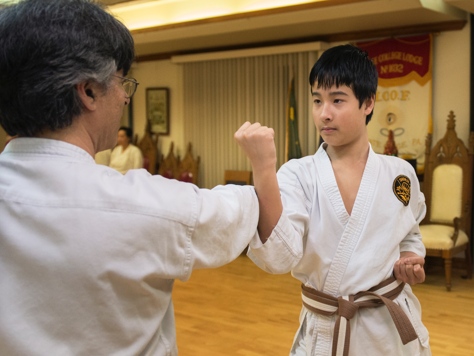 Matt Kaplan and his son spar