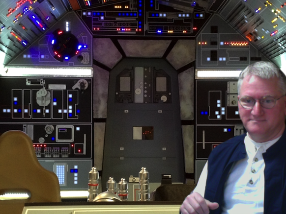 man dressed as Hans Solo from Star Wars movies standing in front of Star Wars-themed virtual background 