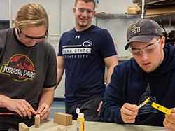 Students use materials such as paper, wood and cardboard to create prototypes of their EDSGN 100 projects.